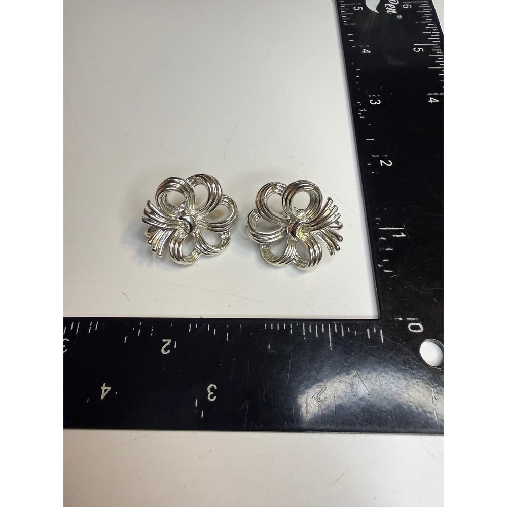 Monet Silver Tone Floral Bow Clip On Earrings Textured Ribbon Design
